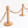 Wooden Stanchion Posts with Metal Chain Barrier on White Background Royalty Free Stock Photo