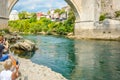 A high diver swims after jumping from the old bridge into the Neretva River in Mostar, Bosnia and Herzegovina