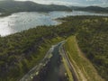 High drone aerial landscape of Eungella Dam with dead tees visible