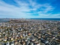 High drone aerial view of densely populated New Jersey shore towns by the ocean Royalty Free Stock Photo