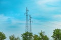 High electricity pylons with overhead power line cables Royalty Free Stock Photo