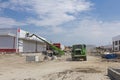 High elevated team of workers on construction site.