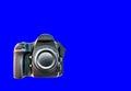 High end dslr camera front view, isolated on a blue background Royalty Free Stock Photo