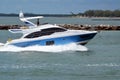 High-end light blue and white cabin cruiser Royalty Free Stock Photo