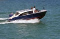 High-end motor boat speeding on the Florida Intra-Coastal Waterway Royalty Free Stock Photo