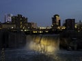 High Falls waterfall, Rochester, New York at night. Royalty Free Stock Photo
