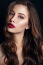 High fashion look. glamor closeup portrait of beautiful stylish brunette young woman model with bright makeup with red lips. Royalty Free Stock Photo