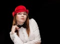 High fashion look. portrait of beautiful sexy young female woman with red lips on black background with hat Royalty Free Stock Photo