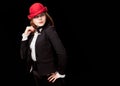 High fashion look. portrait of beautiful sexy young female woman with red lips on black background with hat Royalty Free Stock Photo