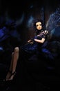 High fashion model in blue dress and fantasy s Royalty Free Stock Photo