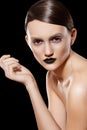 High fashion model. Hairstyle, make-up, black lips