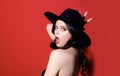 High-fashion portrait. Sexy sensual elegant woman in black hat. Trendy Retro fashion. Isolated. Royalty Free Stock Photo