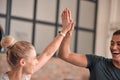 High five, fitness and people teamwork, sports goals and collaboration gym training, team building or support. Athlete