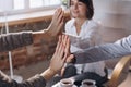 Close-up male and female hands. Happy married couple, young man and woman talking with consultant about life