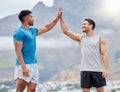 High five, man and friends for outdoor fitness in summer, sport and happy by mountain. Teamwork, support and hands Royalty Free Stock Photo