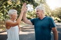 High five, success or senior couple fitness in running workout, exercise or training in nature park or Canada garden Royalty Free Stock Photo