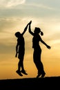 High five at sunset in north Idaho. Royalty Free Stock Photo