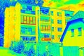 High flat house behind family house in Infrared thermovision scan