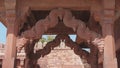 high frame rate tilt up shot of an ornate doorway at fatephur sikri