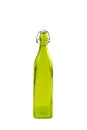 High green glass bottle isolated on white background olive oil. White plastic cork and ply rusty latch in the bottle neck Royalty Free Stock Photo