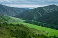High green mountains and dark clouds Royalty Free Stock Photo