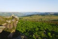 High on the gritstone cliffs of Surprise View, out over a misty Derbyshire