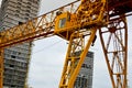 High heavy yellow metal iron load-bearing construction stationary industrial powerful gantry crane of bridge type on supports Royalty Free Stock Photo