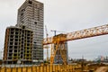 High heavy yellow metal iron load-bearing construction stationary industrial powerful gantry crane of bridge type on supports Royalty Free Stock Photo