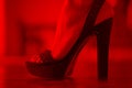 High heel sandal in red light