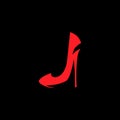 High heel shoe symbol on black backdrop Royalty Free Stock Photo