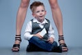 High heels family concept. Stylish baby boy standing with his fa Royalty Free Stock Photo