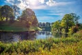 Hills with grass, trees and a river between them in the park that surrounds the fortress citadel Kastellet. Copenhagen,