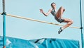 High jump, woman and fitness with exercise, sport and athlete in a competition outdoor. Jumping, workout and training Royalty Free Stock Photo