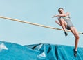 High jump, woman and sport with exercise, cardio and athlete in competition outdoor. Jumping, workout and training for Royalty Free Stock Photo