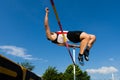 High jump in a worm eye's view Royalty Free Stock Photo