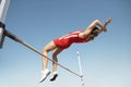 High Jumper In Midair Over Bar Royalty Free Stock Photo