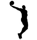 High jumping Basketball player in jump throw, Best Slam Dunk with a ball. Silhouette. Royalty Free Stock Photo