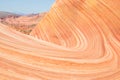 Large wave of striated sandstone in Arizona canyon
