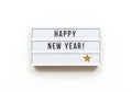 Minimalist Light Box Sign Displaying a Happy New Year! Greeting and Star. Royalty Free Stock Photo