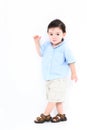 High Key Toddler Boy Standing Against White Wall