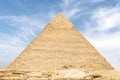 high largest pyramid of Chephren on the background of a blue sky with clouds, Giza, Cairo, Egypt. second pyramid. Pyramid of Royalty Free Stock Photo