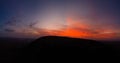 High level aerial view of the dramatic sunset over the volcanic mountains near Corralejo Royalty Free Stock Photo