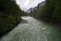 Torrential McDonald Creek in Glacier National Park, Montana after heavy rains. Royalty Free Stock Photo