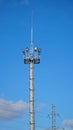 High lighting mast against the blue sky. View from below. Full height Royalty Free Stock Photo
