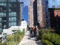 The High Line Park in Manhattan New York. Modern buildings around elevated train tracks above Tenth Ave in New York City