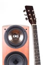 High loudspeaker tower with acoustic guitar Royalty Free Stock Photo