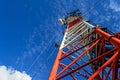 High mast metal structure telecommunication on tower with blue s