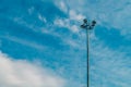 High mast of spot light with cloud on blue sky background