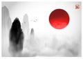 high misty mountains with forest trees and big red sun. Traditional oriental ink painting sumi-e, u-sin, go-hua style Royalty Free Stock Photo