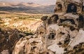 High mountain with cave houses